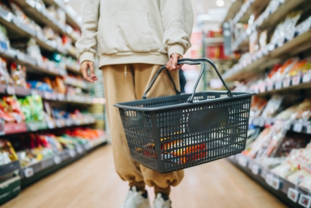 person shopping for groceries in aisle